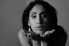 Woman Blowing A Kiss Stock Images