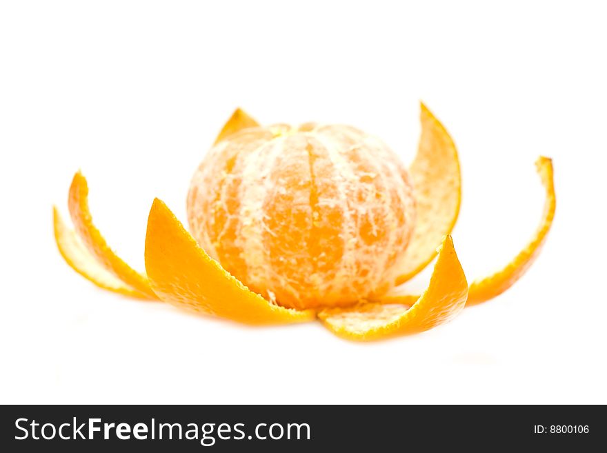 Ripe yellow mandarine on a white background