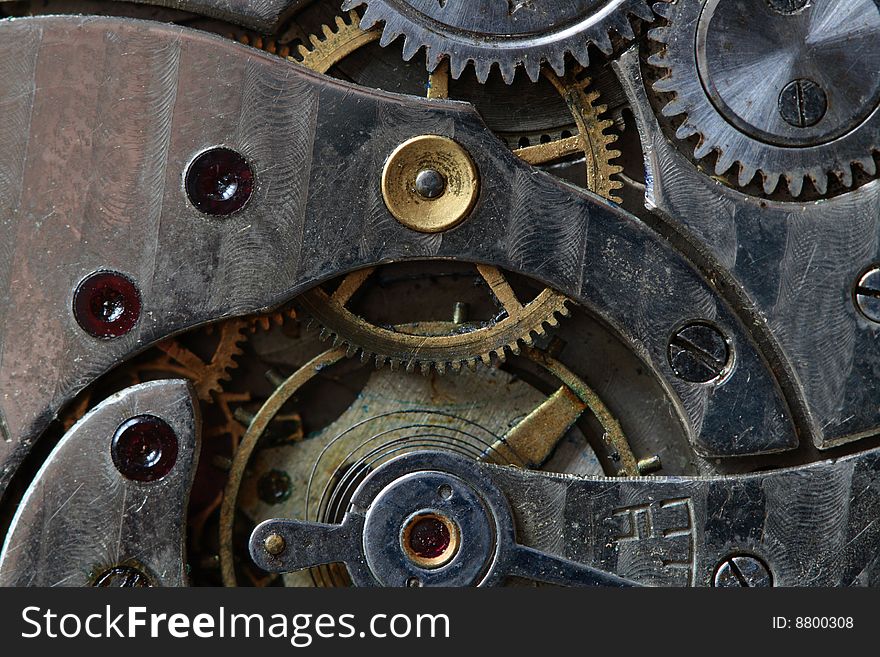 Close-up of old watch mechanism as background