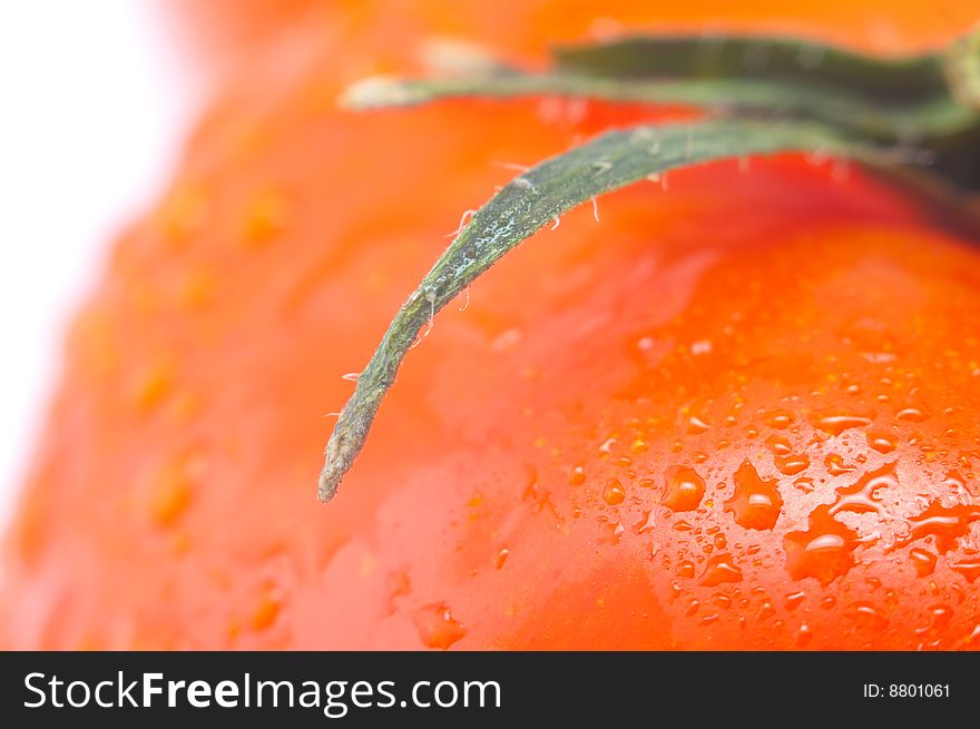 Red fresh tomato isolated on white