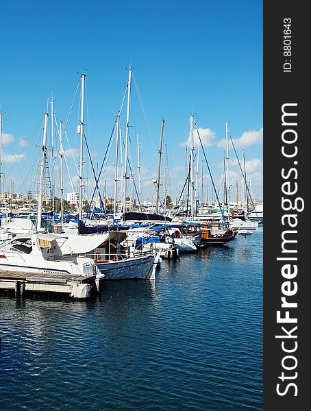 Yachts in the harbor, awaiting favorable winds. Yachts in the harbor, awaiting favorable winds