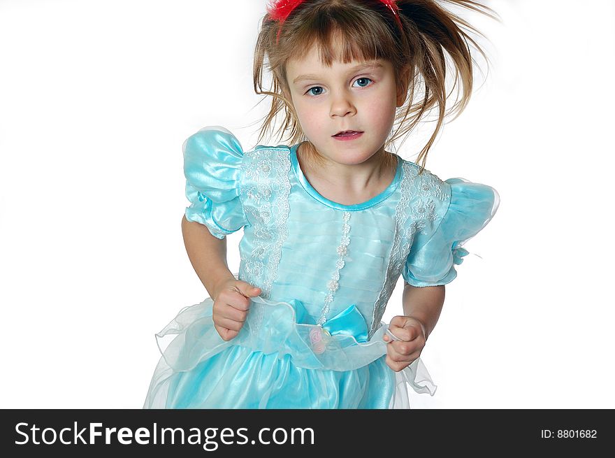 Child wearing a beautiful blue dress dancing