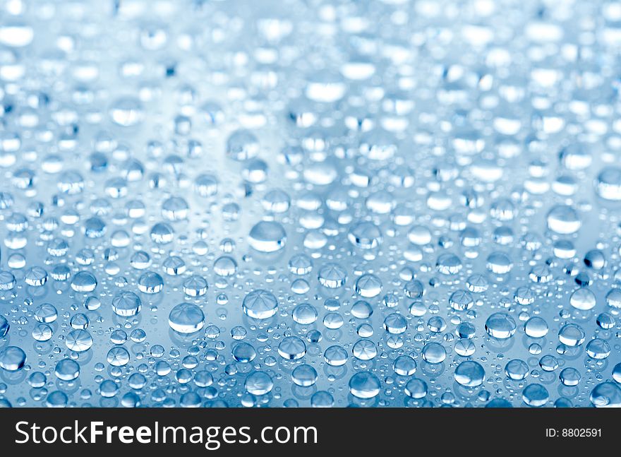 Water drops on glass background. Water drops on glass background