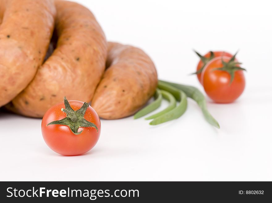 Detail Of Sausages With Tomato