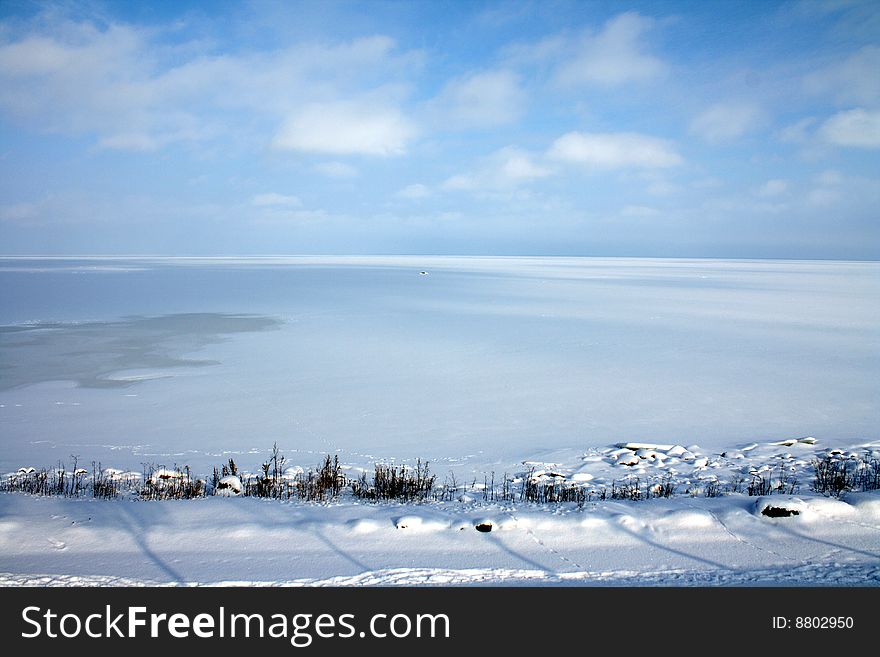 White frozen lake in winter
