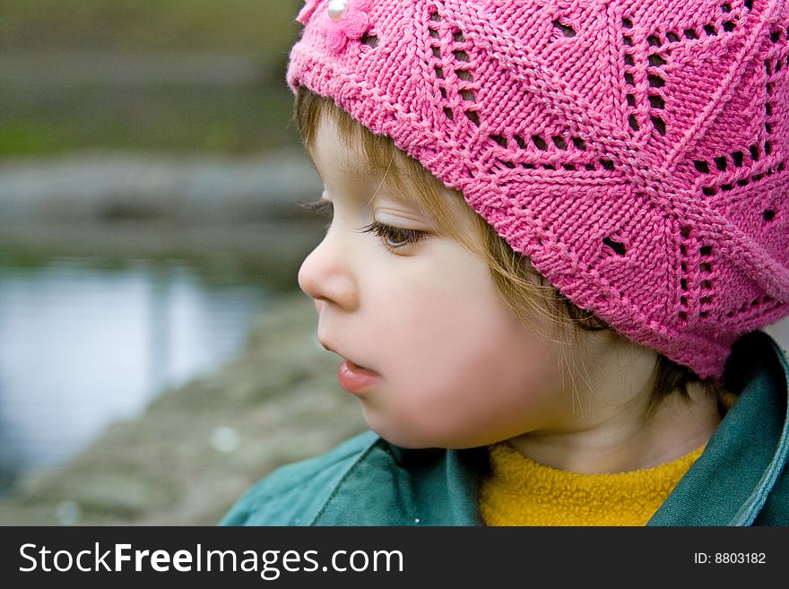 Toddler baby girl in park. Toddler baby girl in park