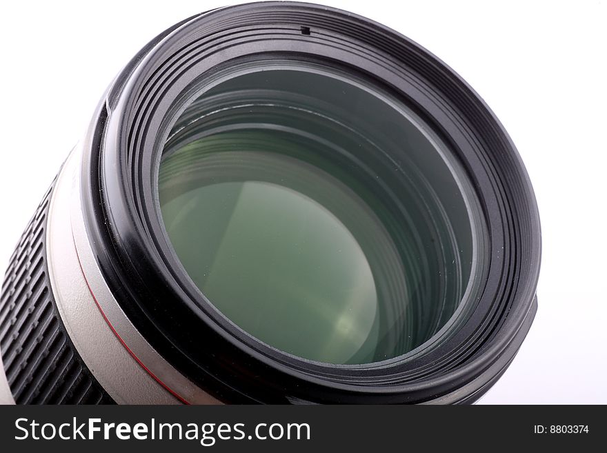 Close-up of a professional camera lens.