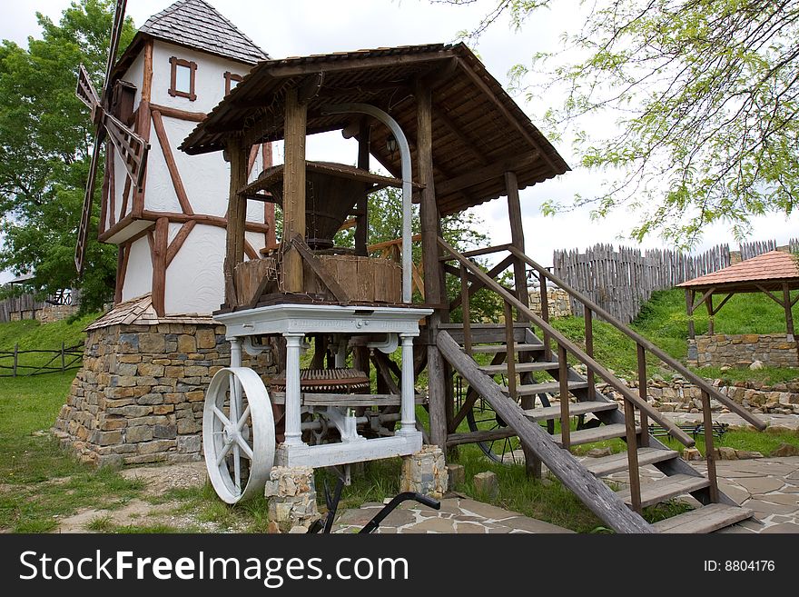 Windmill and grits cutter in a rural museum