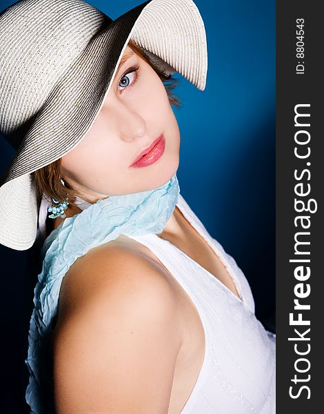 Sexy woman wearing hat on blue background. Sexy woman wearing hat on blue background