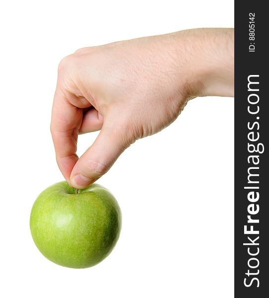 Green apple hanging from hand isolated on white background