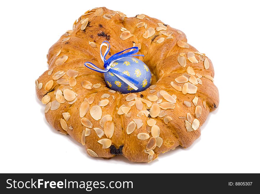 Easter pastry wreath with a blue easter egg in it. Easter pastry wreath with a blue easter egg in it