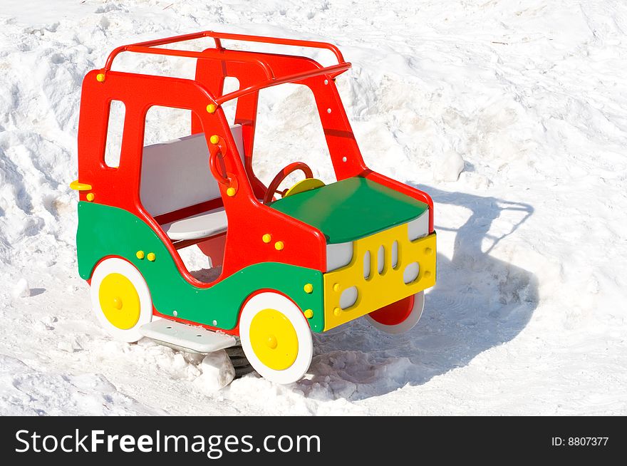 Colorful toy car on the playground