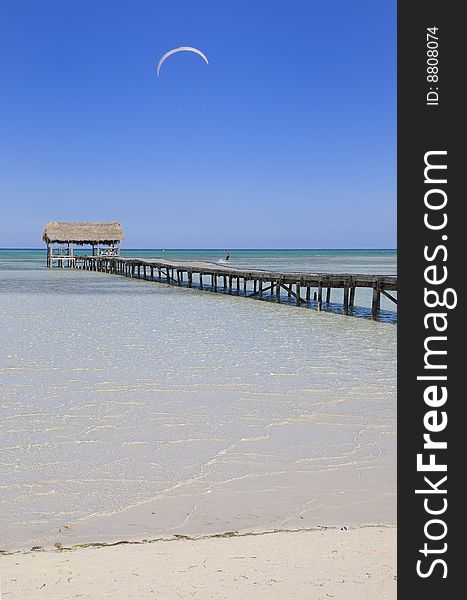 View of tropical cuban beach with wooden walkway, cayo coco. View of tropical cuban beach with wooden walkway, cayo coco.