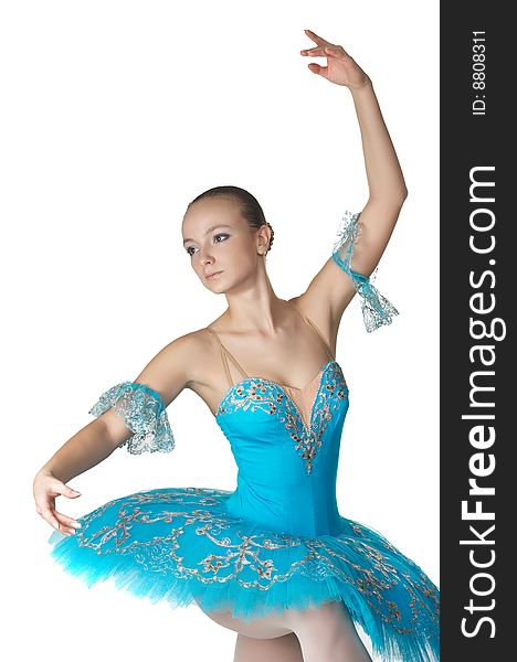 The beautiful young ballerina in dark blue clothes. The beautiful young ballerina in dark blue clothes