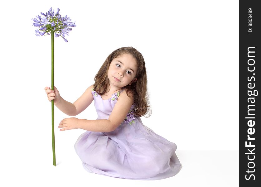 Serene girl with flower