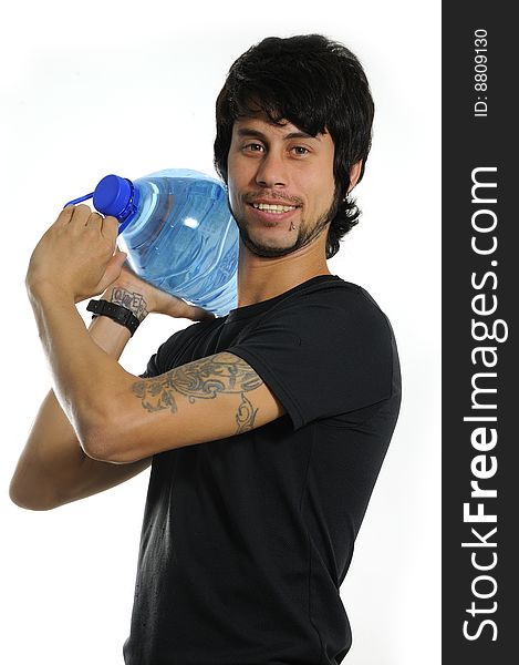 Portrait of young hispanic man carrying water bottle isolated