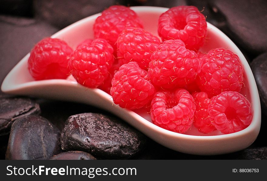 Red Raspberry Fruit on White Ceramic Tray