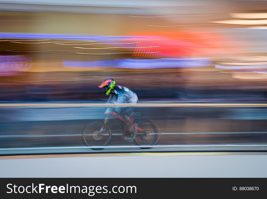 Biker Streaking Past Blurred Background