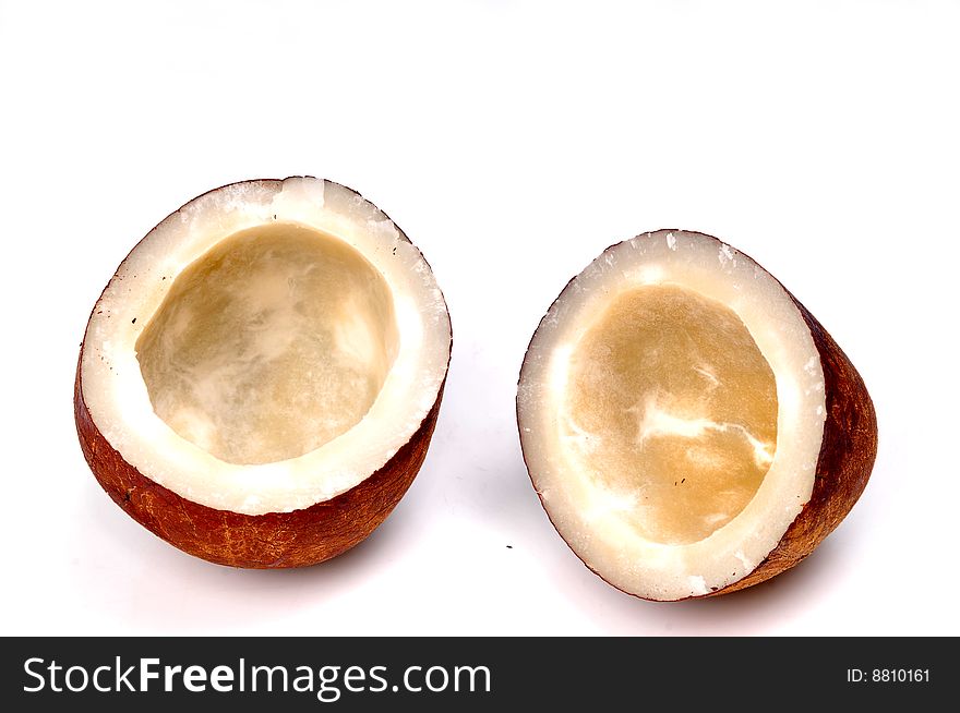 Dry coconut isolated on white.