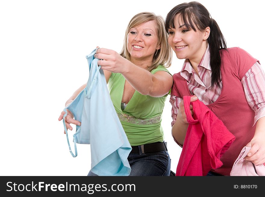 Two attractive women with clothes. Two attractive women with clothes.