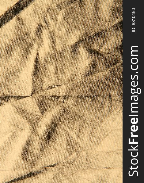 Texture of crumpled gold photo reflector. Texture of crumpled gold photo reflector