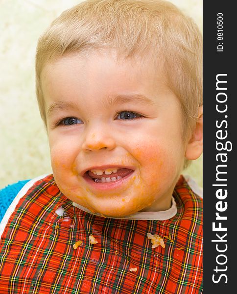 Cute Little Boy Stained With Squash