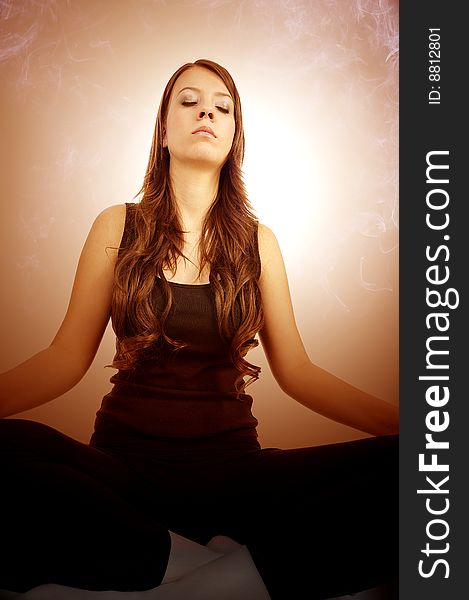 Young woman is doing an expert yoga exercise