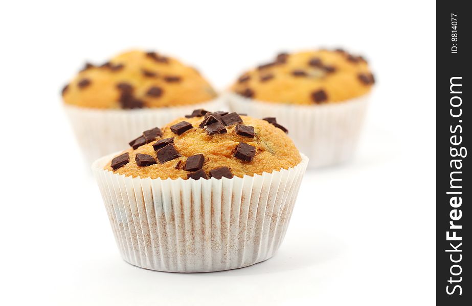 Three muffins isolated on a white background