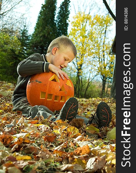 Little boy with halloween pumpkin. Little boy with halloween pumpkin