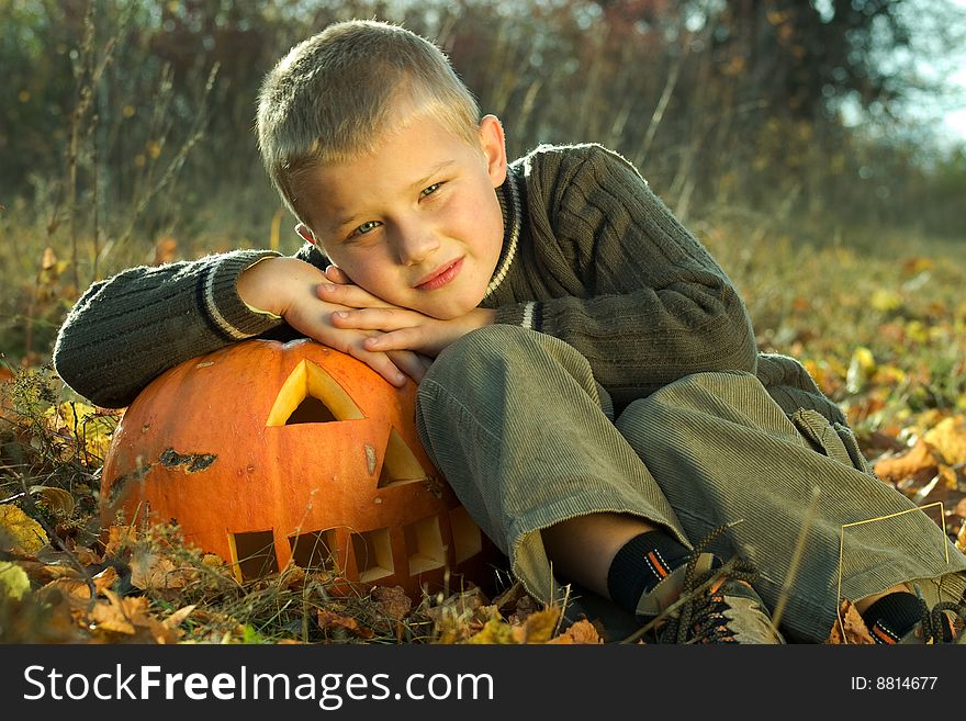 Little boy with halloween pumpkin. Little boy with halloween pumpkin