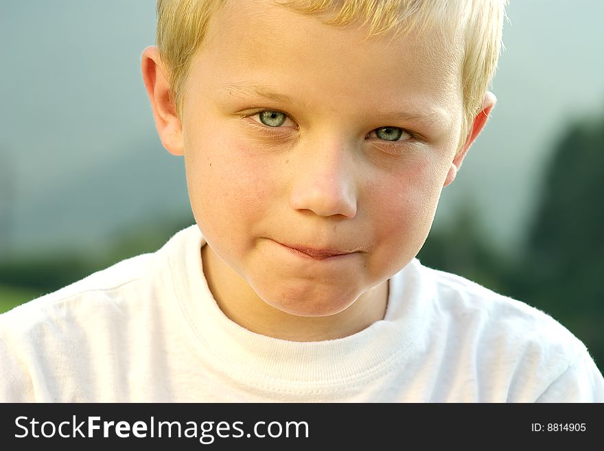 Portrait of little boy with blue eyes