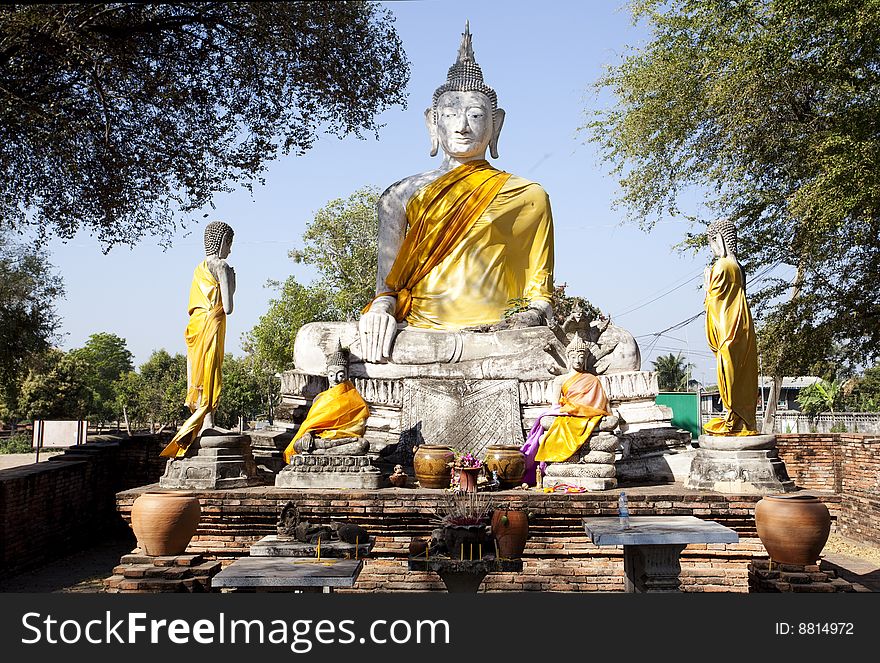 Buddhist shrine with a buddha statues in Ayutthaya, Thailand. Buddhist shrine with a buddha statues in Ayutthaya, Thailand.