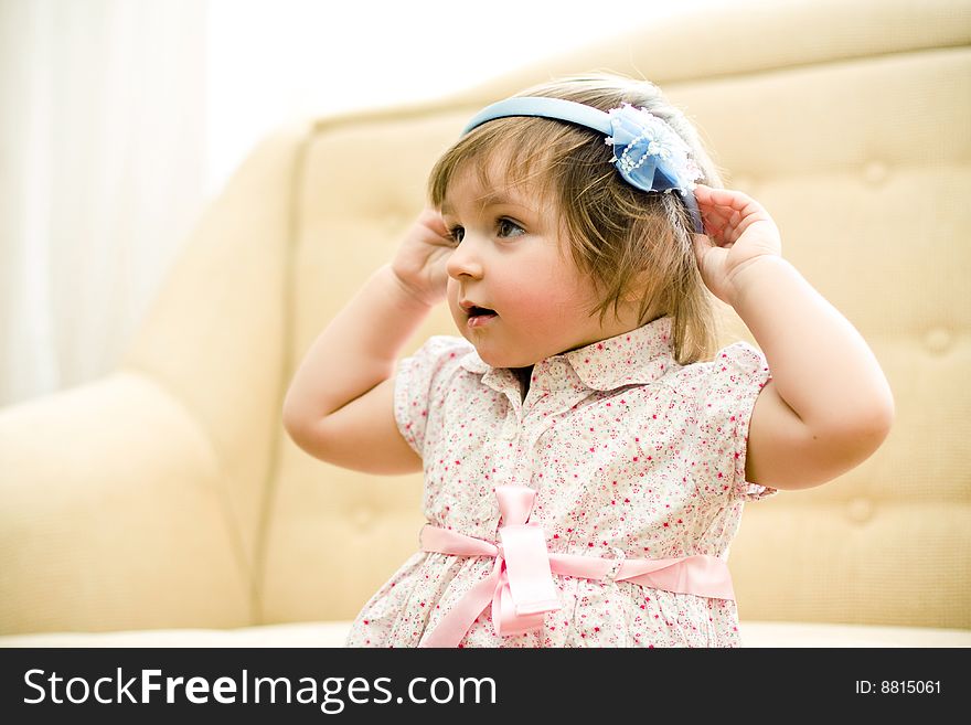 Little beautiful girl wears hoop