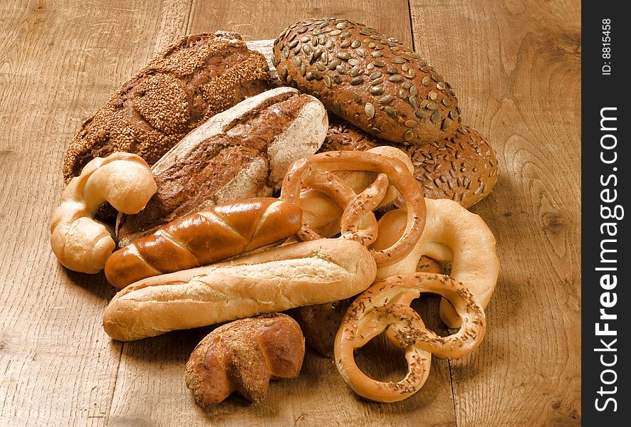 Various types of baked products on a rustic table. Various types of baked products on a rustic table