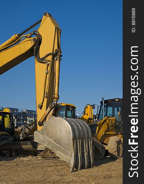 Construction area with excavactor bucket