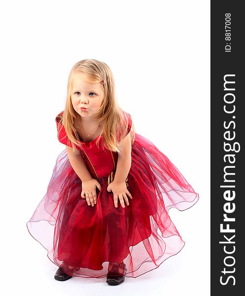 Portrait of the beautiful girl in a red dress. Portrait of the beautiful girl in a red dress