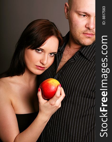 Temptation with a apple,studio shot