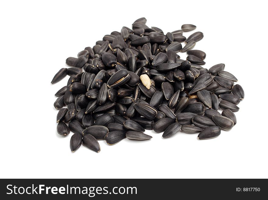 Sunflower seeds are isolated on a white background