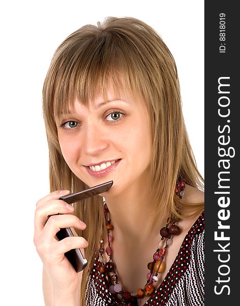 Young Woman Listens On A Mobile Phone