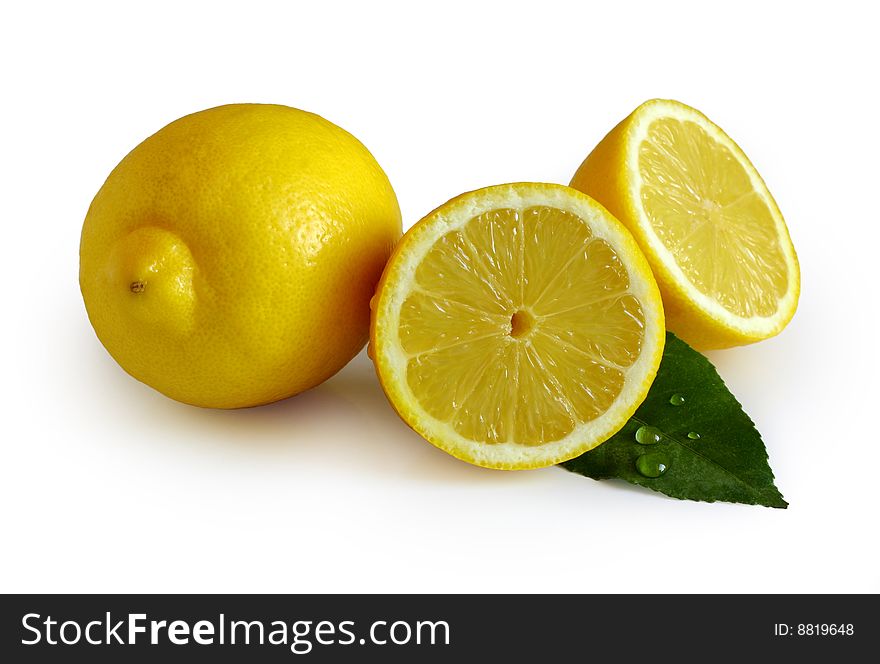 Lemons with a leaf on a white background