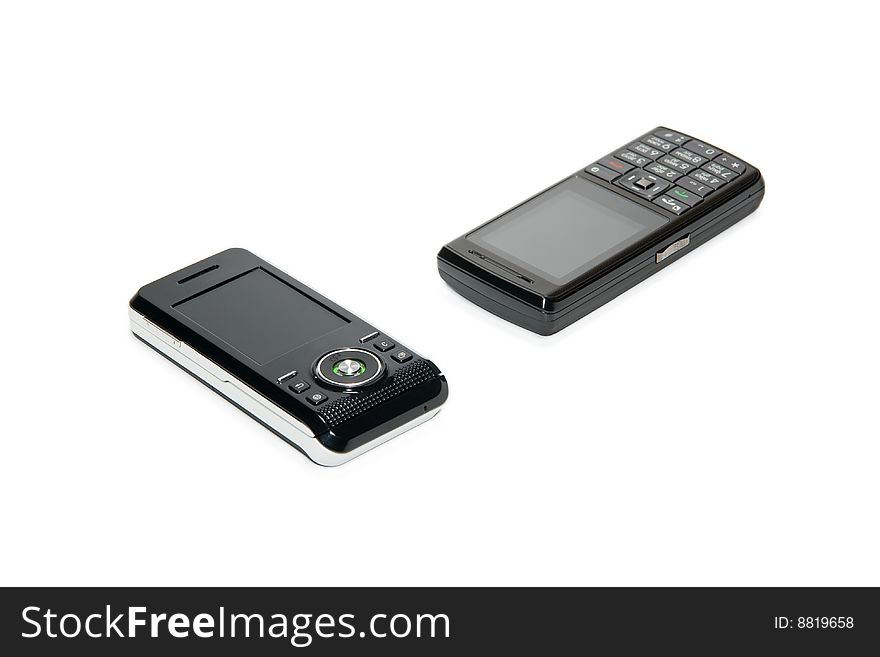 Two telephones of black isolated on the white background