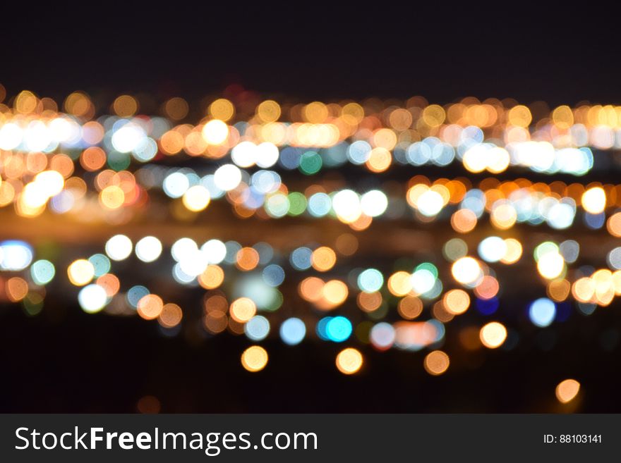 An abstract blur of city lights at night. An abstract blur of city lights at night.