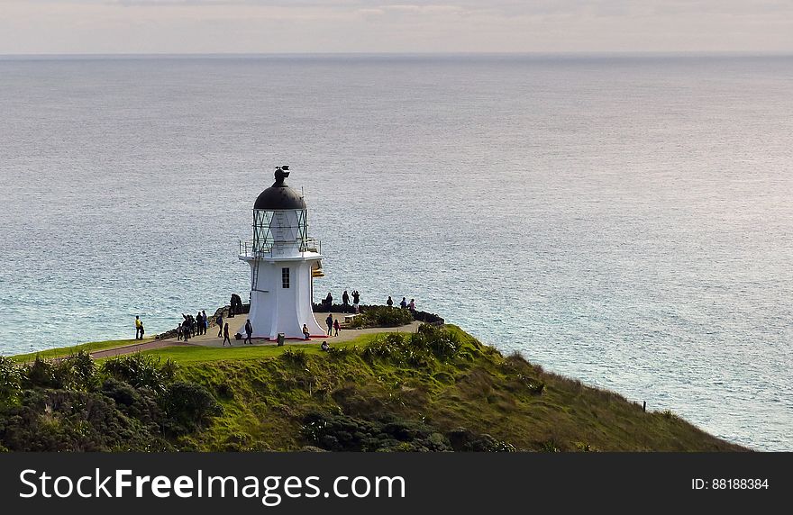Cape Reinga, official name Cape Reinga/Te Rerenga Wairua, is the northwesternmost tip of the Aupouri Peninsula, at the northern end of the North Island of New Zealand. Cape Reinga is more than 100 km north of the nearest small town of Kaitaia. Cape Reinga, official name Cape Reinga/Te Rerenga Wairua, is the northwesternmost tip of the Aupouri Peninsula, at the northern end of the North Island of New Zealand. Cape Reinga is more than 100 km north of the nearest small town of Kaitaia.