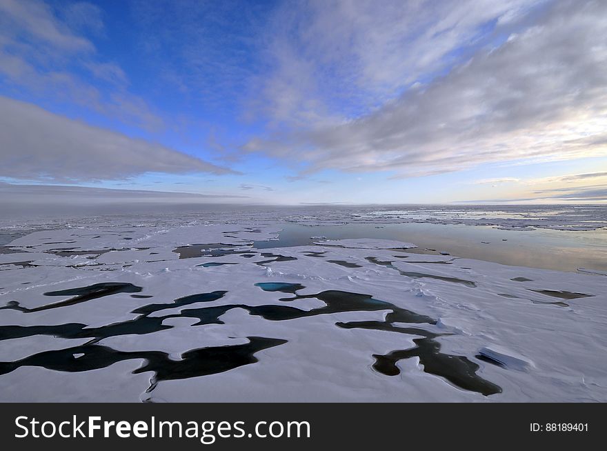 The clouds begin to thin over the Arctic Ocean Aug. 19, 2009. Photo Credit: Patrick Kelley, U.S. Coast Guard. The clouds begin to thin over the Arctic Ocean Aug. 19, 2009. Photo Credit: Patrick Kelley, U.S. Coast Guard