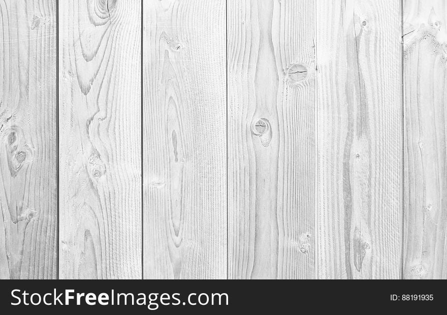 A background of untreated wood in black and white. A background of untreated wood in black and white.
