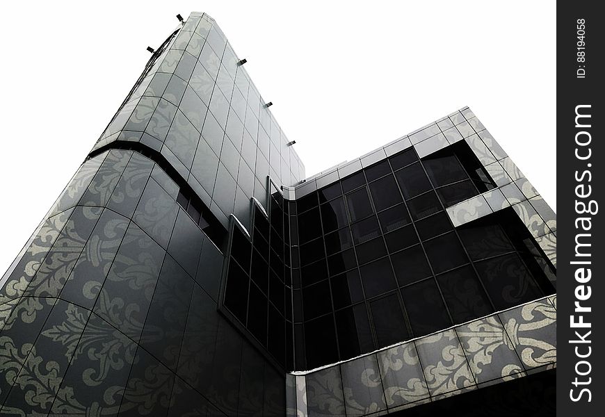 A modern building with a plant pattern on the facade. A modern building with a plant pattern on the facade.