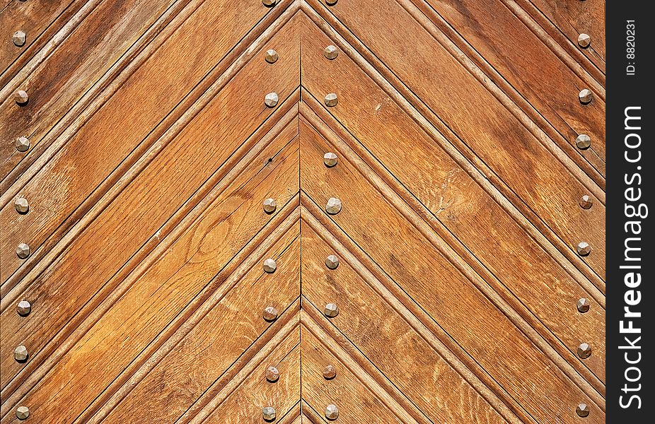 Fragment of durable wooden gate in old castle. Fragment of durable wooden gate in old castle