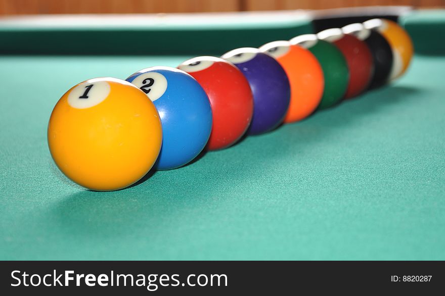 Billiard balls set in row, from one to nine, spectrum of colors. Billiard balls set in row, from one to nine, spectrum of colors