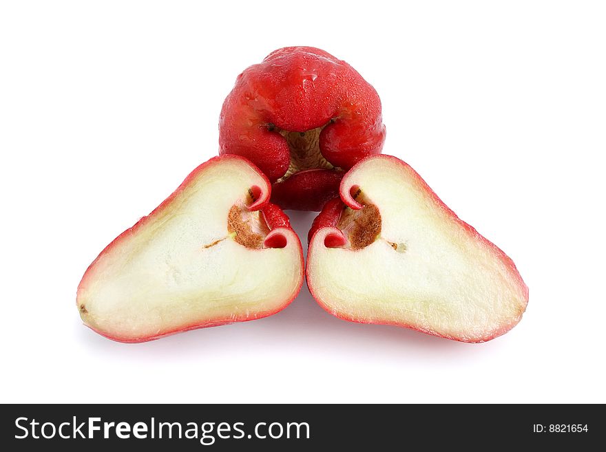 Water apple sliced into half isolated on white background.