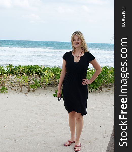 This well dressed young lady works at a resort in mexico.happy personality. This well dressed young lady works at a resort in mexico.happy personality.